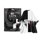 Black-and-white split-design barber cape displayed beside its packaging