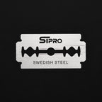 Close-up of an STPRO double edge razor blade with Swedish steel marking