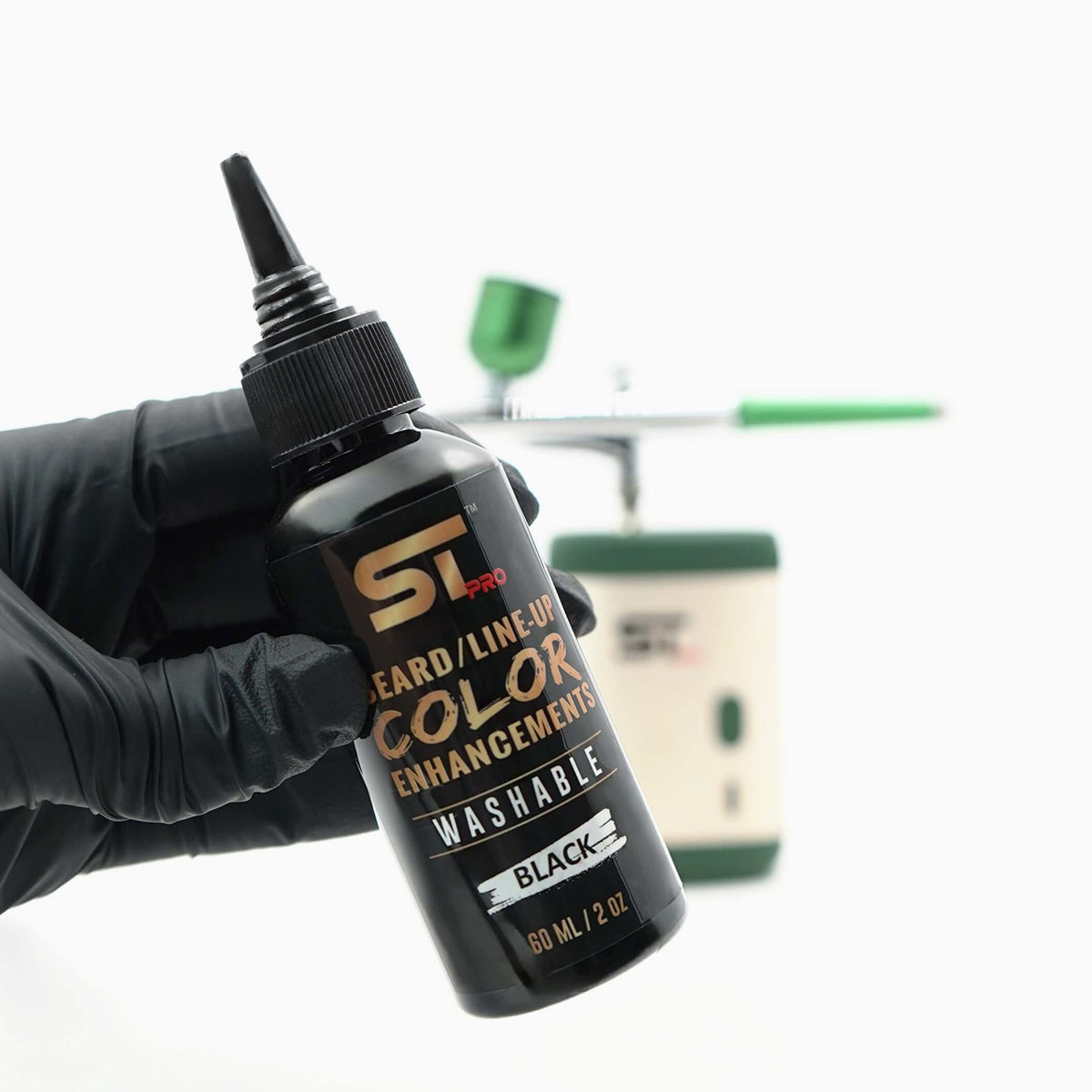 Supreme Trimmer washable black hair enhancement ink held by a barber for precise hairline and beard definition